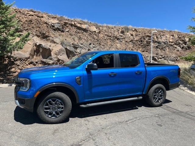2024 Ford Ranger XLT in Blue Metallic — front three-quarter view