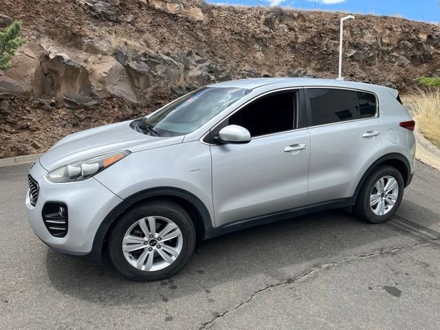 2018 Kia Sportage LX in Sparkling Silver — front three-quarter view